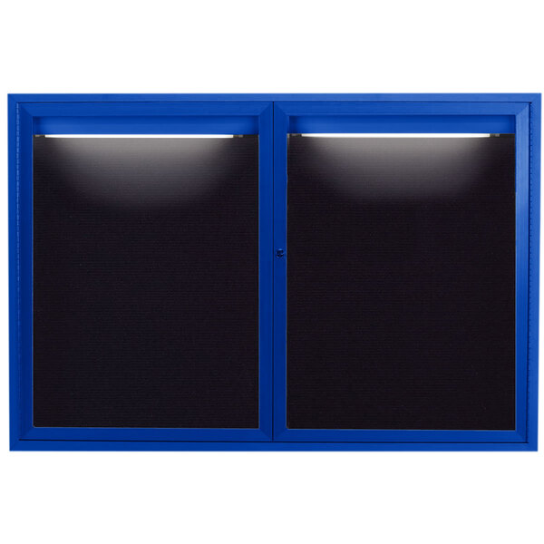 A blue Aarco indoor message center with black letter board and lights on top.