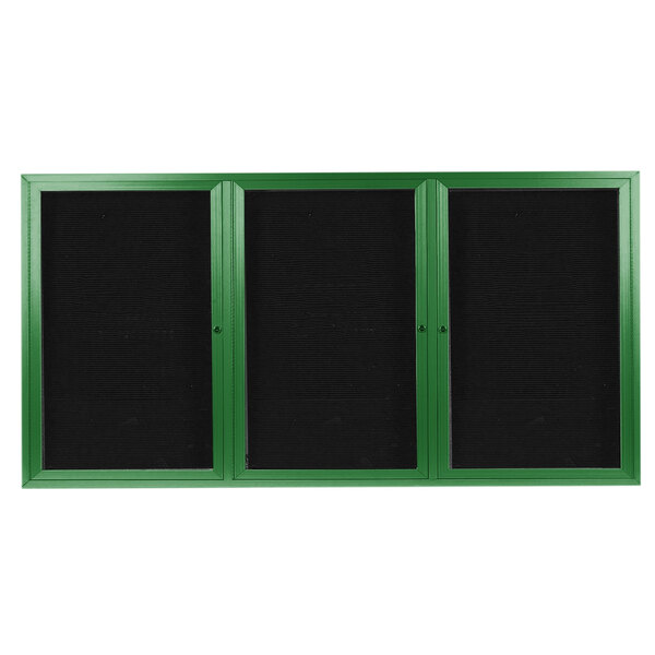 A green Aarco message center with black trim and 3 doors.