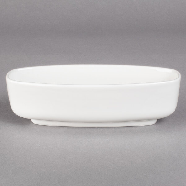A close-up of a Villeroy & Boch white porcelain bowl with a small rim.
