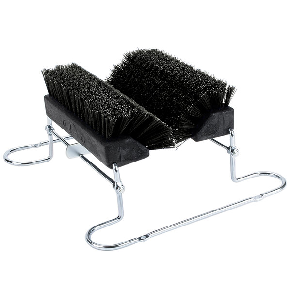 A black and silver Carlisle brush holder with two Spectrum brushes on a stand.