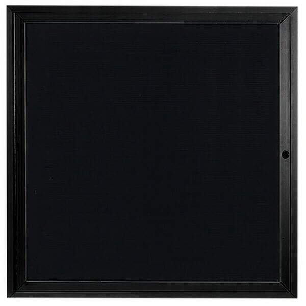 A black square frame with a black border and a black letter board inside.