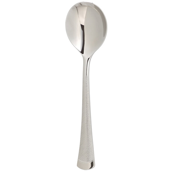 An Arcoroc stainless steel soup spoon with a handle.