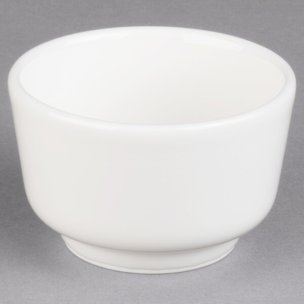 A white Villeroy & Boch porcelain bowl on a gray surface.