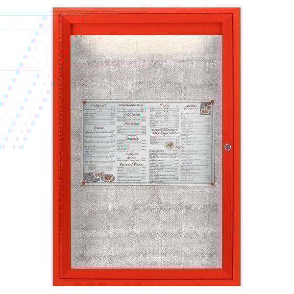 A red framed Aarco outdoor bulletin board with a menu inside.