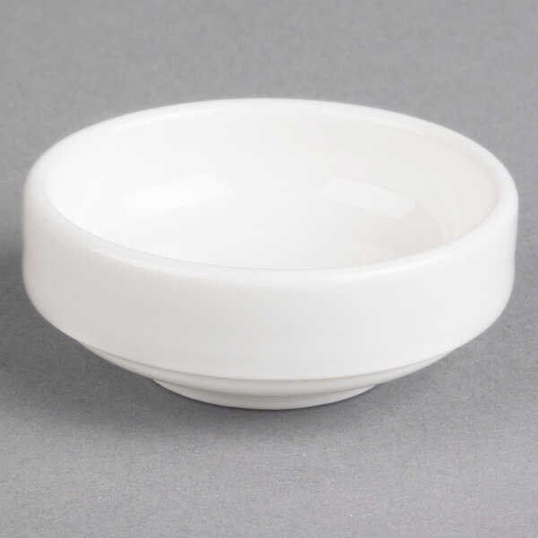 A white Villeroy & Boch porcelain bowl on a gray surface.