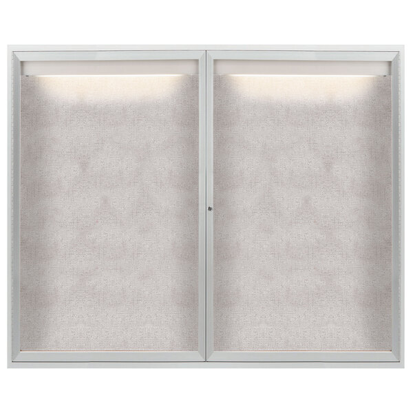 A white framed glass door with lights on it.