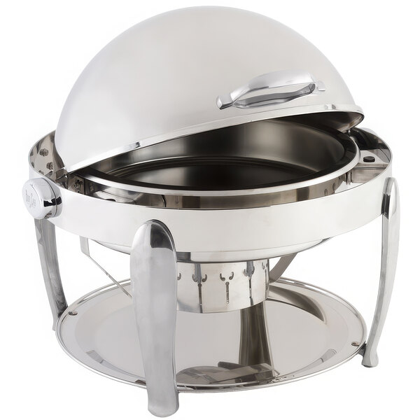 A Bon Chef stainless steel roll top chafer with chrome accents on a table outdoors.