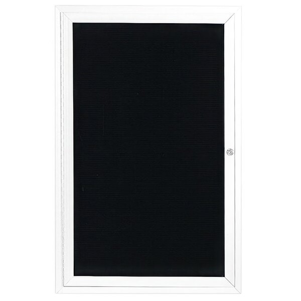 A white enclosed Aarco message center with a black letter board and white frame.