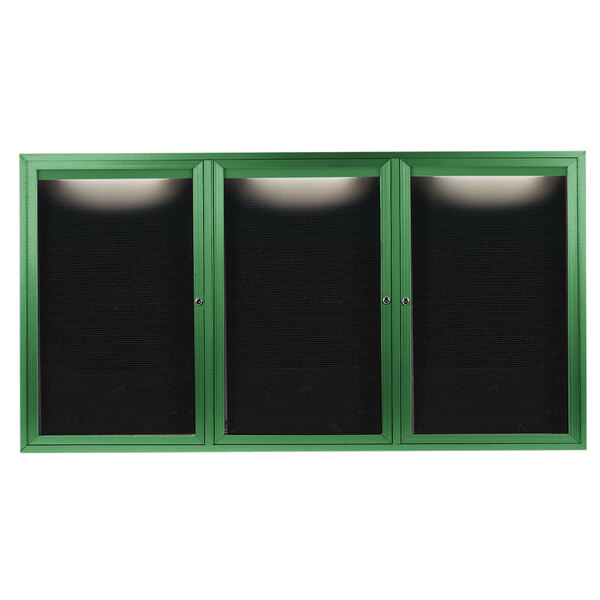 A green cabinet with black rectangular doors and a green border containing a black letter board.