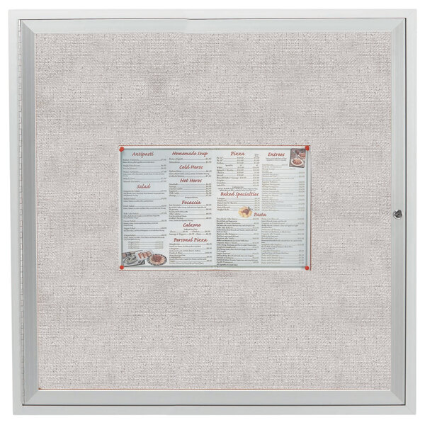 An Aarco satin anodized aluminum outdoor bulletin board with a menu and price list on it.