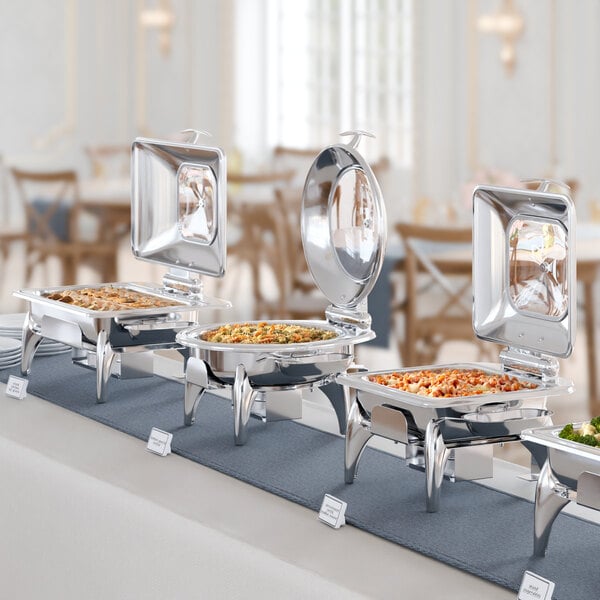 An Acopa Voyage chafing dish on a buffet table with a soft-close lid.