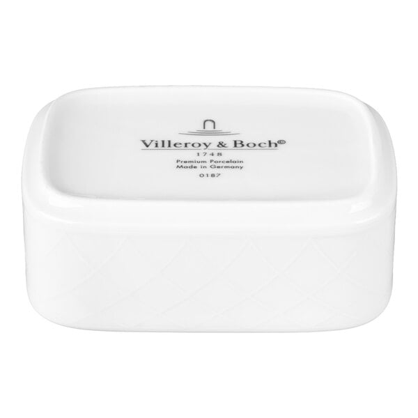 A white rectangular porcelain container with a subtle diamond pattern and the Villeroy & Boch logo printed on the lid.