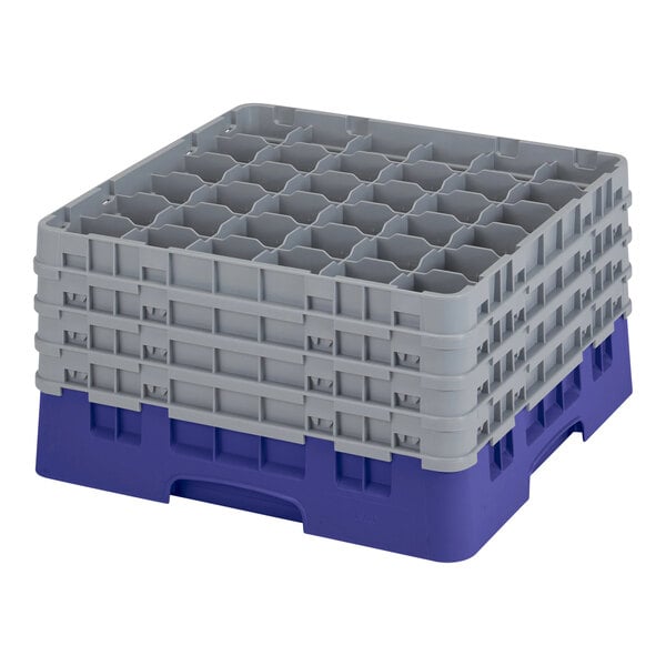 A navy blue plastic Cambro glass rack with purple extenders.