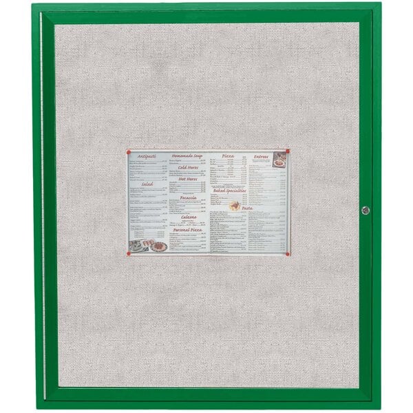 An Aarco green outdoor bulletin board cabinet with a menu and price list inside.