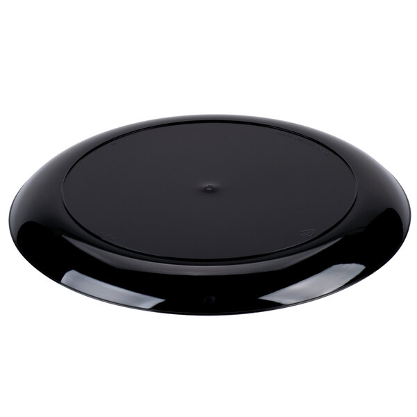 A black circular WNA Comet Designerware plastic plate.