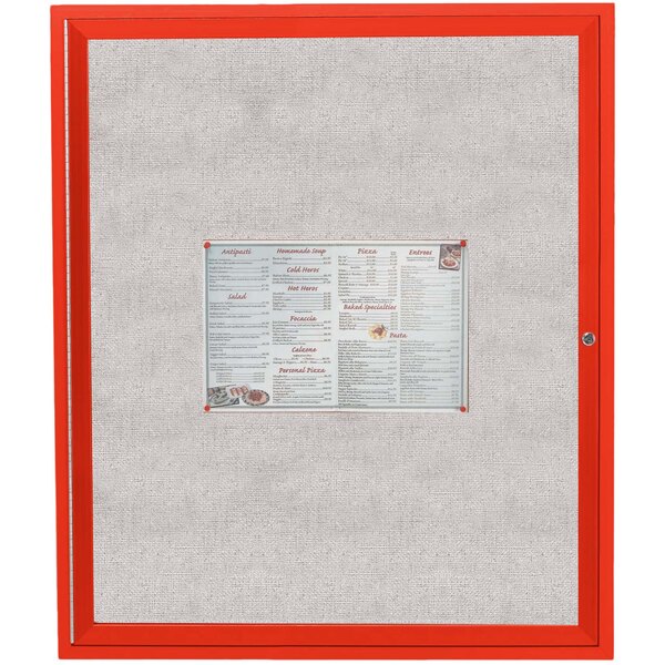 An Aarco red powder coated bulletin board cabinet with a menu and price list inside.
