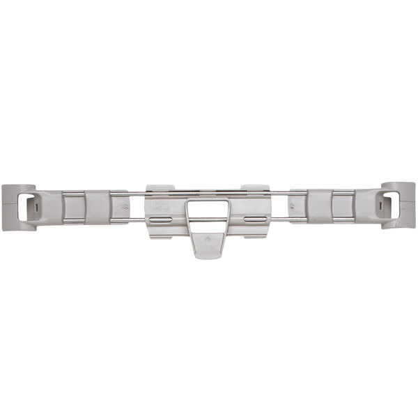 A white plastic MetroMax 4 shelf ledge with metal clips.