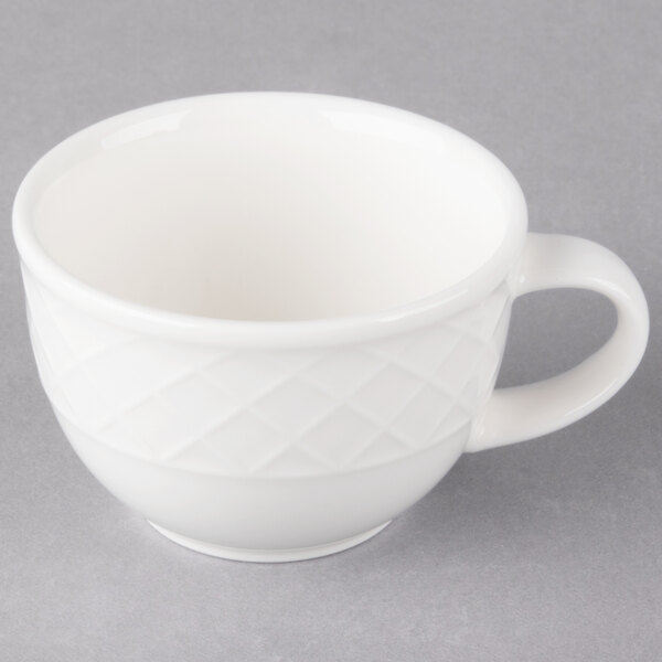 A Villeroy & Boch white porcelain cup with a handle.