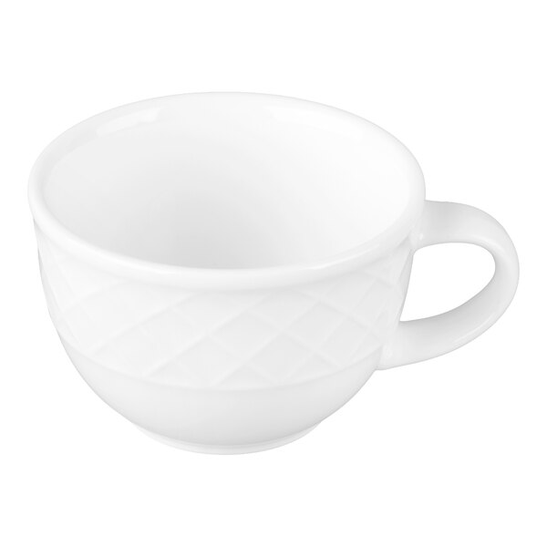 A white porcelain cup with a handle and a subtle diamond pattern around the exterior.