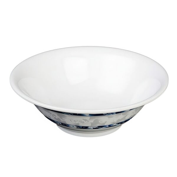 A white bowl with blue dragon designs.