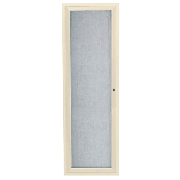 An ivory rectangular object with a glass door.
