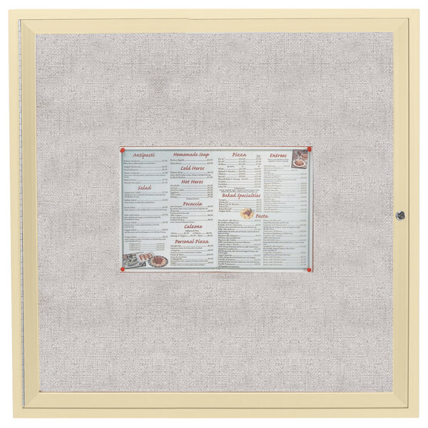 An ivory bulletin board cabinet with a white menu inside.