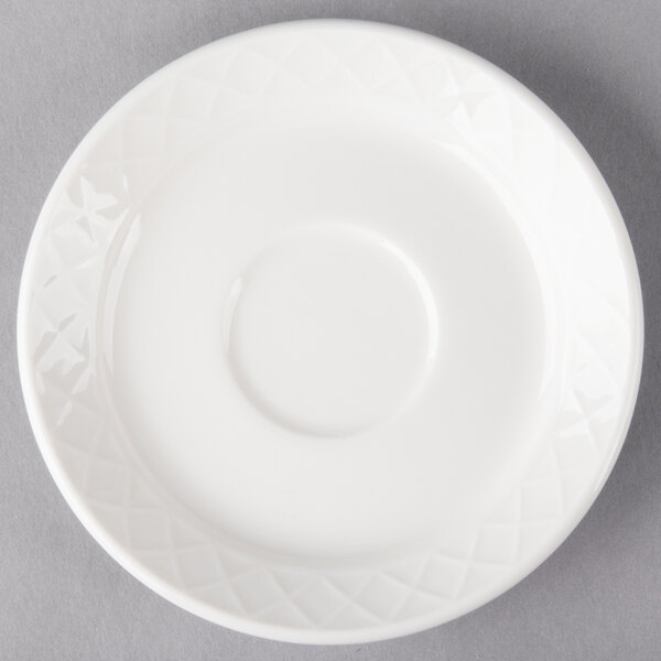 A white Villeroy & Boch porcelain saucer with a circle pattern.