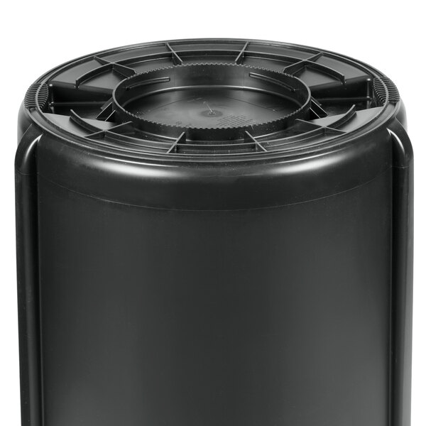 A Rubbermaid black plastic drum with a lid.