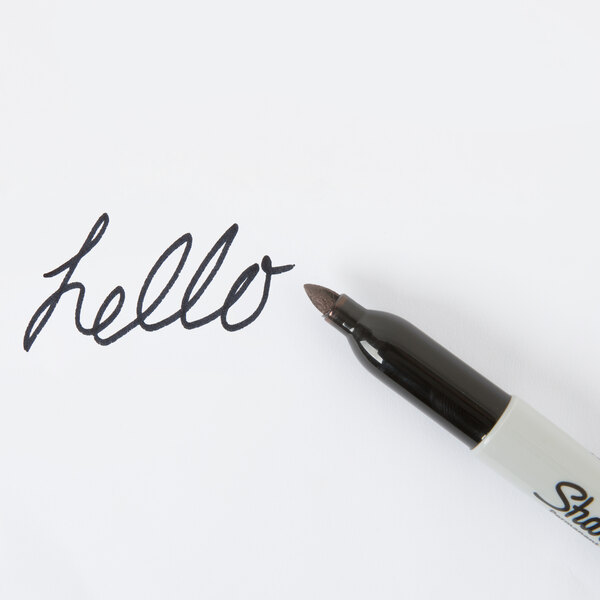 The cap of a black Sharpie Extreme Fine Point marker.