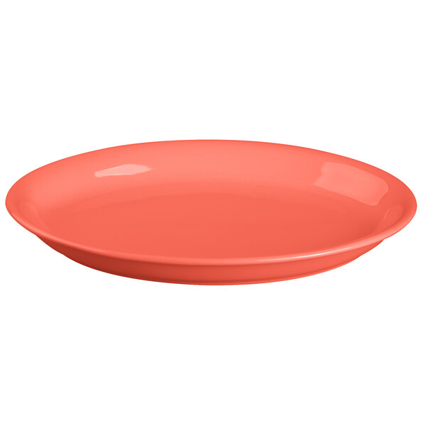 An oval Tuxton china platter with a bright orange color.