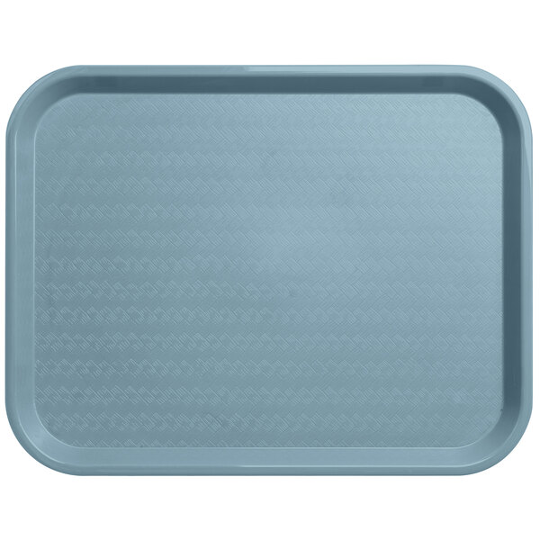 A Carlisle slate blue plastic fast food tray on a counter.