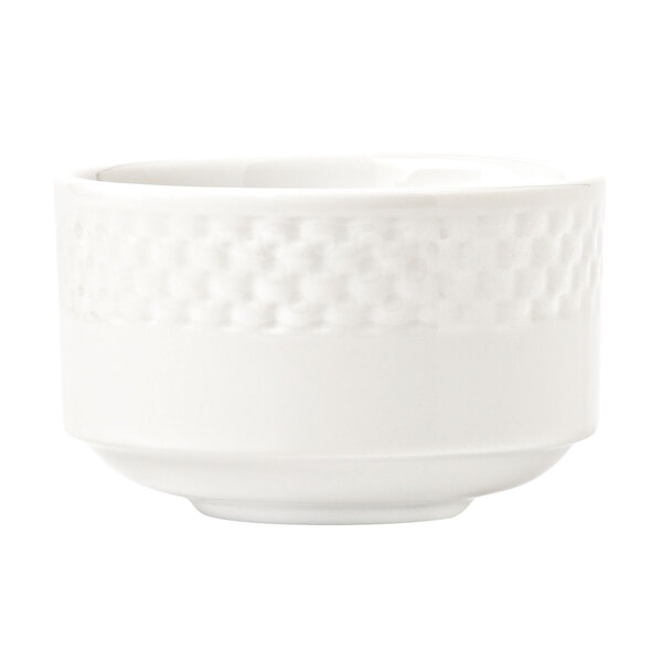 A close up of a Libbey Lunar Bright White Porcelain Bouillon bowl with a pattern on it.