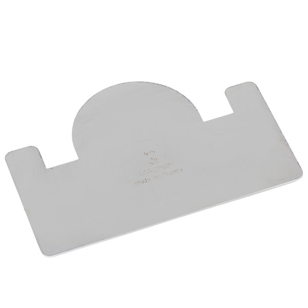 A Matfer Bourgeat stainless steel Buche cake comb with a circle cut out.