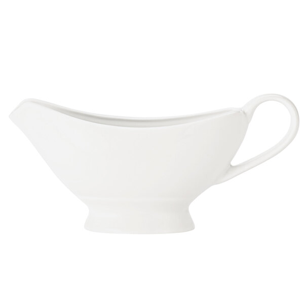 A white Libbey sauce boat with a handle.