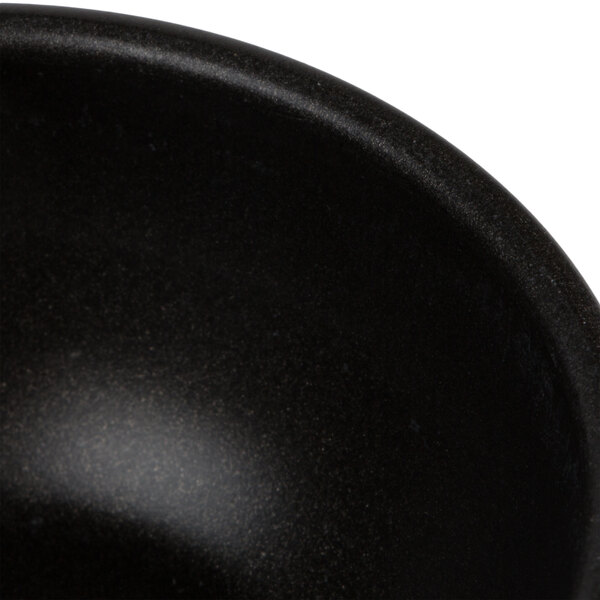 A close up of a Matfer Bourgeat non-stick pomponnette mold.