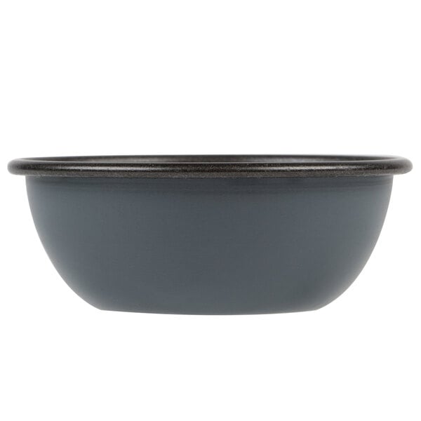 A Matfer Bourgeat steel non-stick pomponnette mold on a table in a home kitchen.