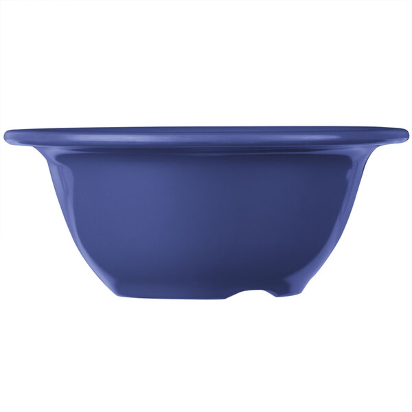 A close-up of a blue Carlisle rimmed melamine bowl on a white background.
