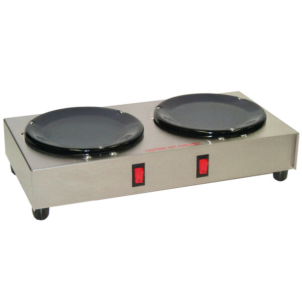 A Grindmaster double burner decanter warmer with black plates on a metal surface.