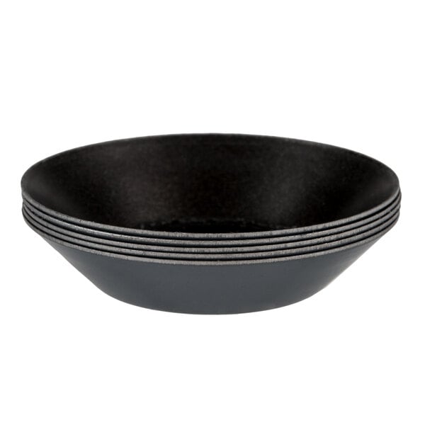 A stack of Matfer Bourgeat quiche molds.