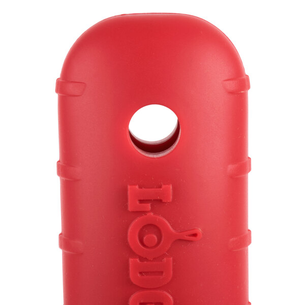 A red silicone handle holder with a hole in it.