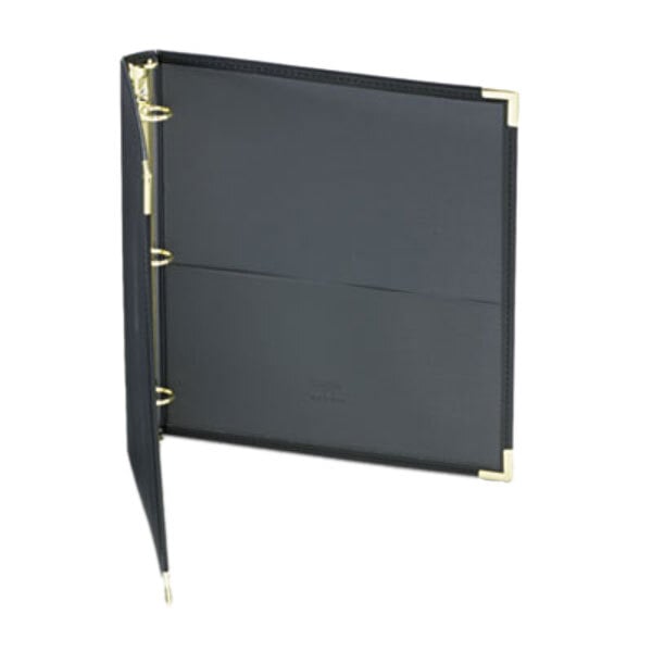 A black leather binder with gold corners.