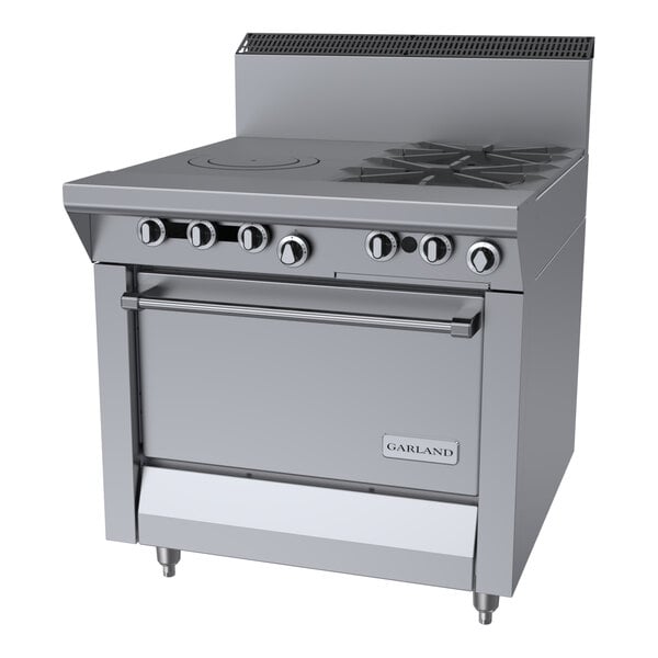 A commercial stainless steel range with two burners, a front-fired hot top, and a standard oven.