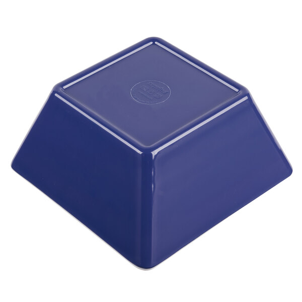 A blue and white square melamine bowl with a logo on it.