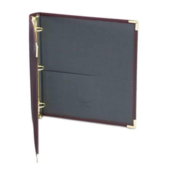 A close-up of a burgundy Samsill Classic Collection ring binder with gold trim.
