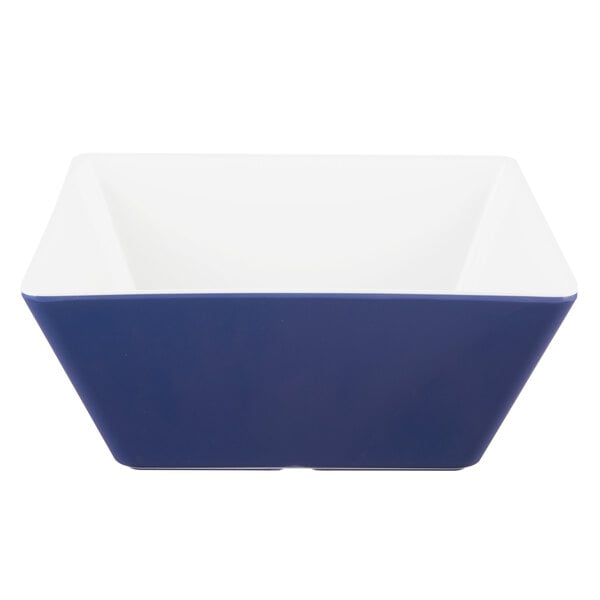 A blue and white square bowl with a white border.
