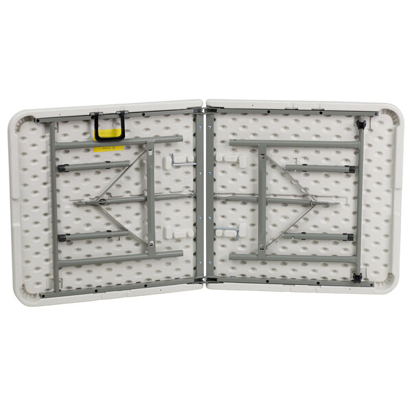 A Flash Furniture rectangular white plastic folding table with metal legs.