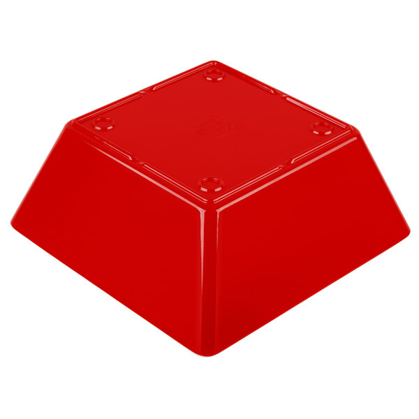 A red square melamine bowl with a white background.