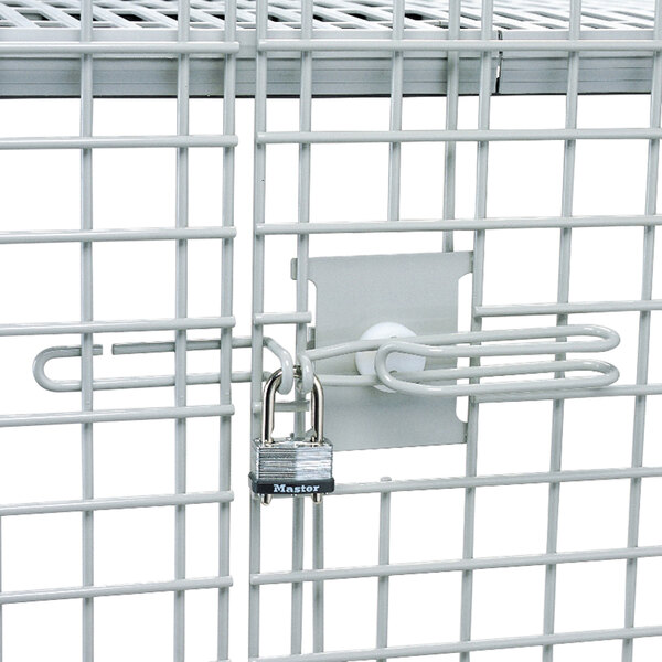 A white MetroMax Q Heavy Duty Mobile Security Unit cage with a lock on it.