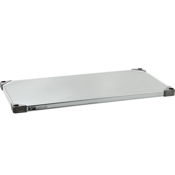 A silver rectangular Metro Autoclave shelf.