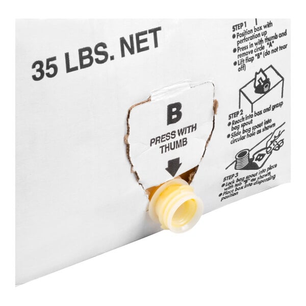 A white box labeled '35 LBS. NET' with a perforated section partially removed, revealing a yellow spout and printed instructions for dispensing.